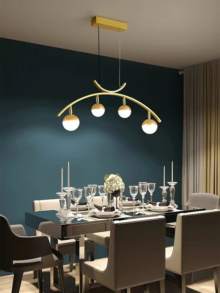 Lustra LED 20W arcuita aurie cu 4 globuri acril, lumina neutra 4000K, 1000 lm, suspendata deasupra mesei de dining