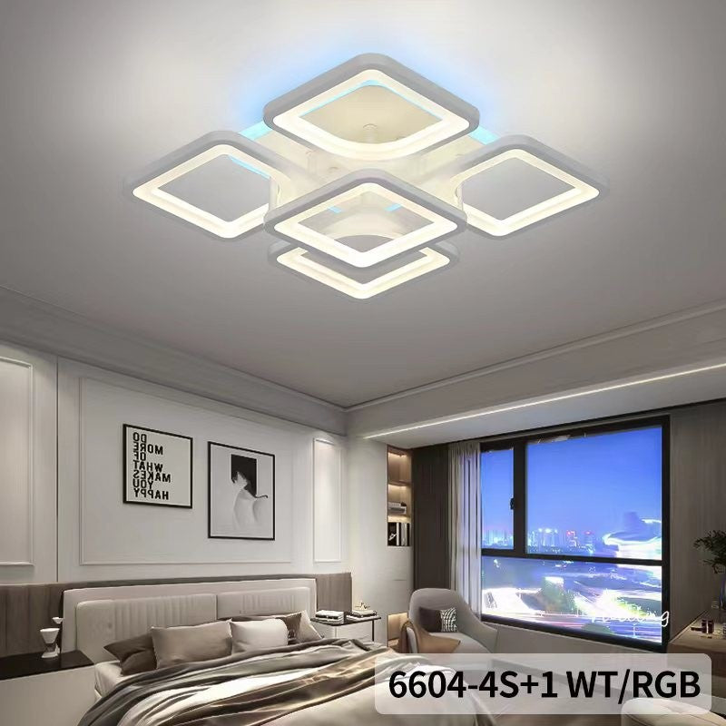 Plafoniera LED RGB cu retroiluminat colorat, montata pe tavan in dormitor modern, aspect decorativ elegant