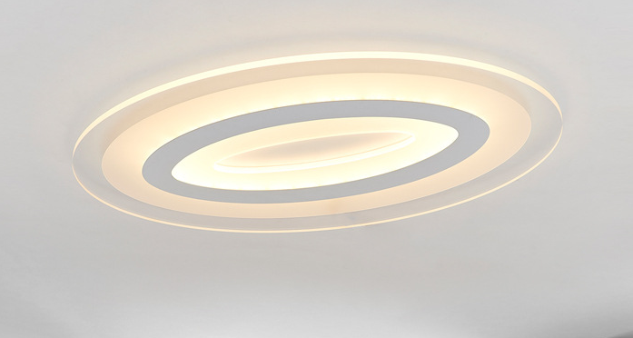 Lustra LED ovala montata pe tavan, iluminata cu lumina calda, inele concentrice acril mat
