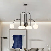 Lustra suspendata cu 6 globuri albe mat, brate metalice negre curbate, diametru 800 mm, montaj tavan, living modern