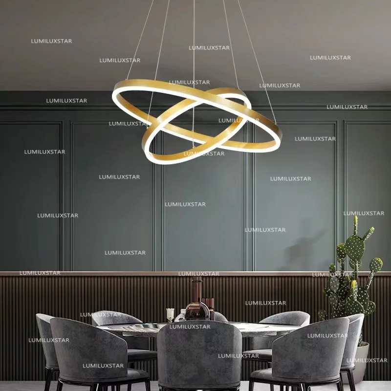 Lustra LED cu doua inele incrucisate aurii, 43W, 2000 lm, lumina reglabila 3000K-6400K, suspendata deasupra mesei de dining