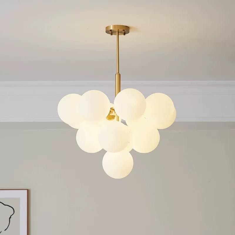 Lustra suspendata cu 13 globuri din sticla mata alba, structura metalica aurie, montaj pe tavan, G9
