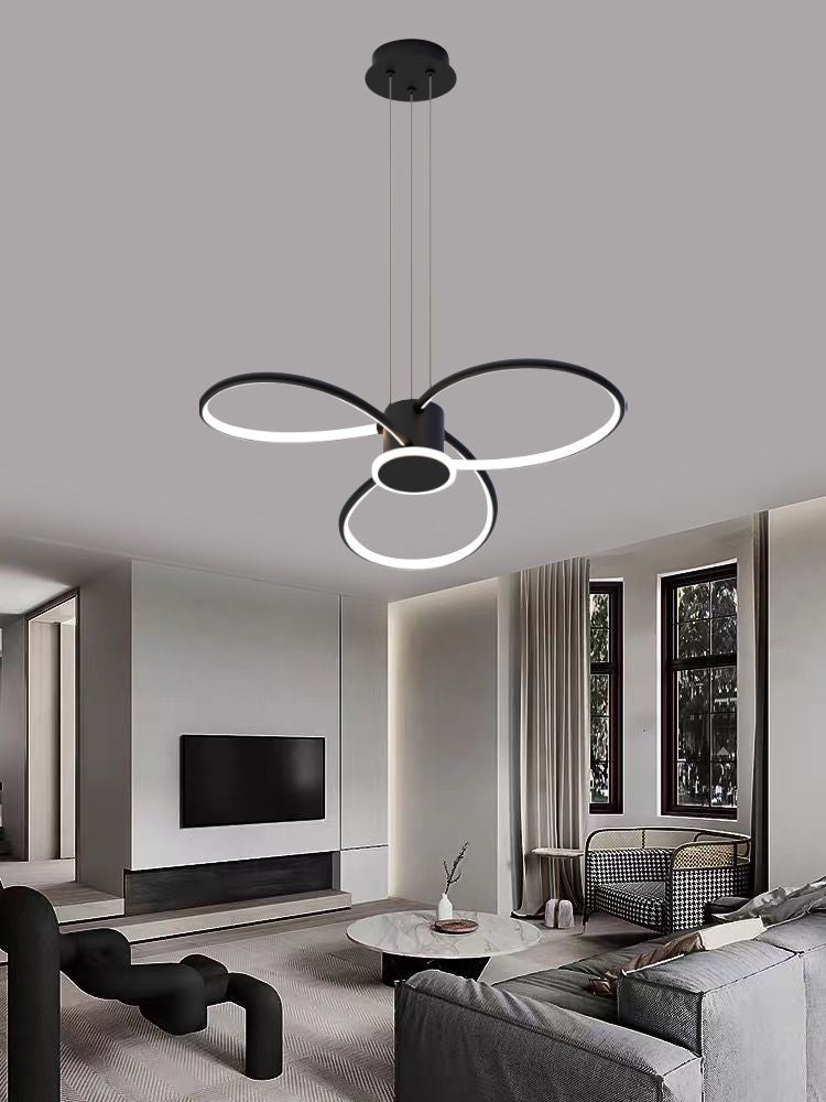 Lustra LED suspendata cu inele asimetrice negre intr-un salon contemporan, 3000K-6500K reglabil